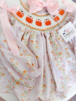 Load image into Gallery viewer, GIRLS SMOCKED PUMPKINS WITH PINK SATIN RIBBONS DIAPER SET/DRESS(converts to dress length 4T and up)
